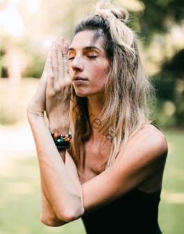 woman in black tank top wearing silver ring