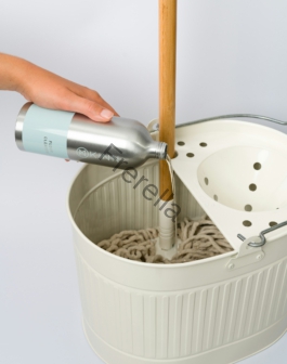 a person using a hair dryer to dry their hair