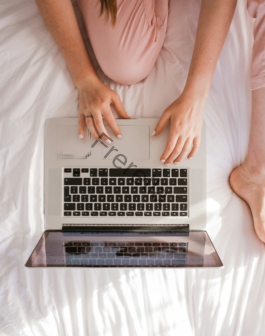 woman using MacBook Pro
