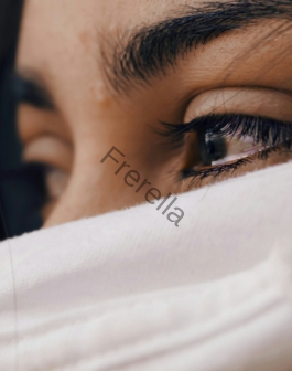 shallow focus of a woman's sad eyes