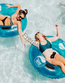 women on inflatable rings